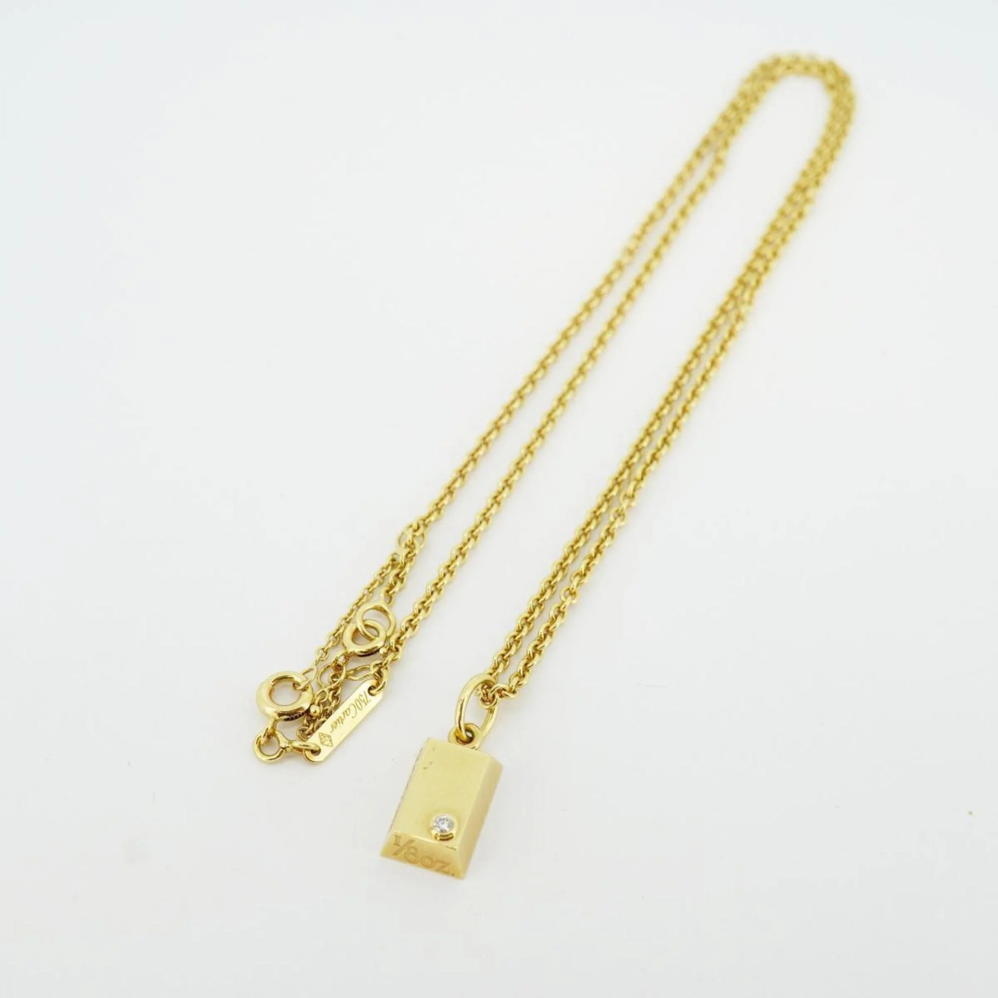   The Luxury Closet Cartier 18K Yellow Gold and Diamond Oz Ingot Bar Pendant Necklace