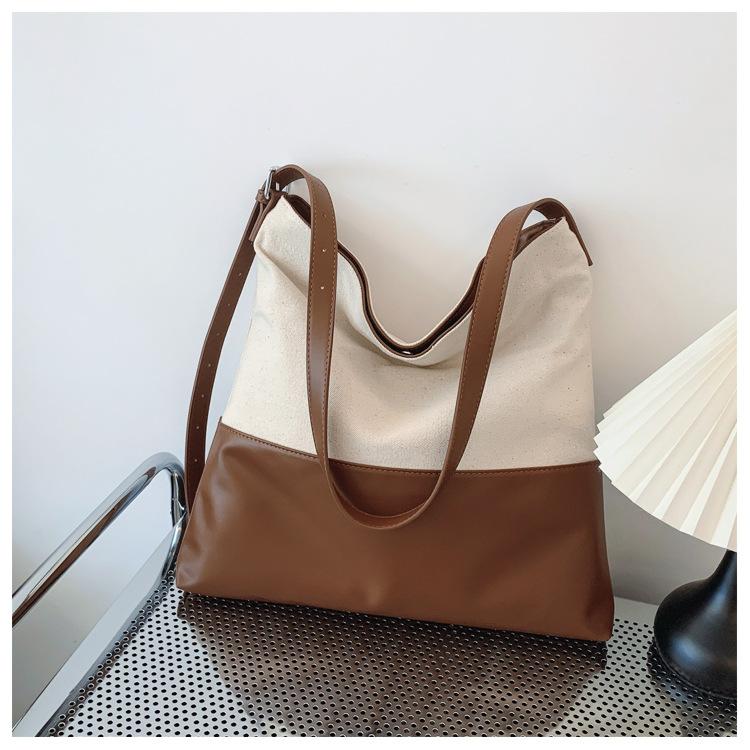Women s bag 2024 autumn new contrasting color splicing fashion bucket bag large capacity mother and child shoulder bag чёрный
