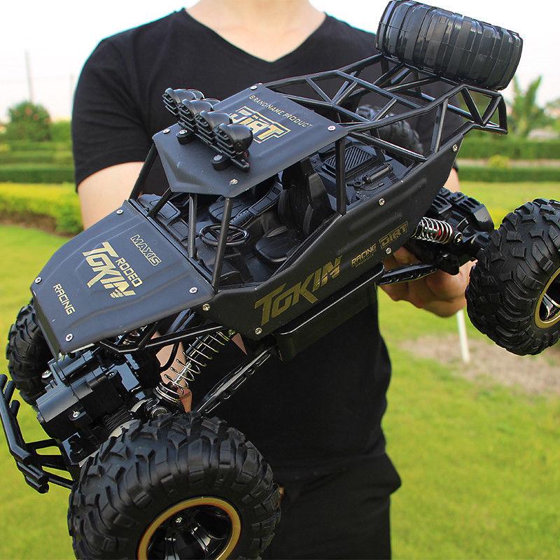 Радиоуправляемые автомобили Радиоуправляемая машина 1/12 4WD с дистанционным управлением, высокоскоростной автомобиль, 2,4 ГГц, внедорожные игрушки, детский подарок 28cm чёрный