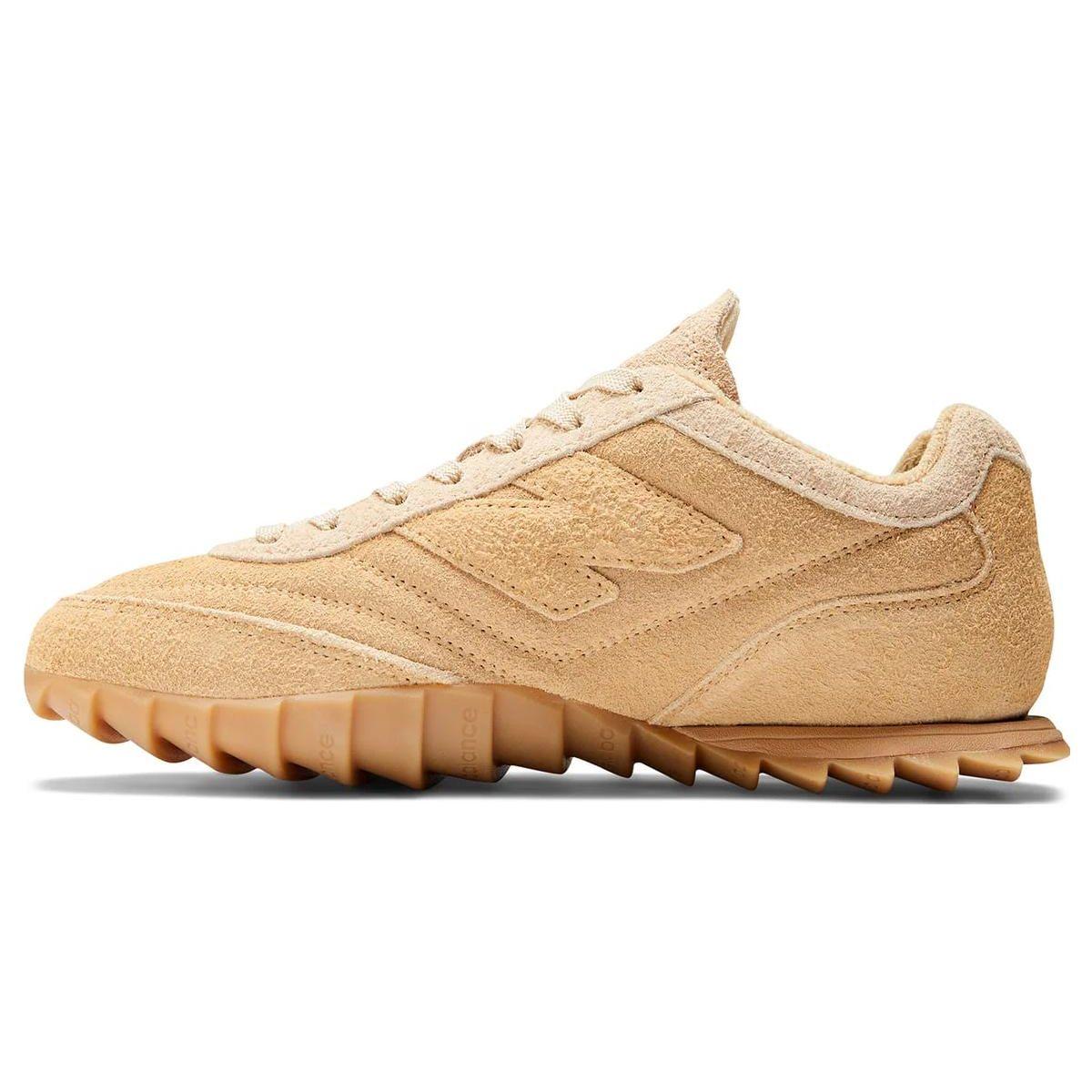 Кроссовки унисекс New Balance AURALEE x RC30 оранжево-коричневые URC30AU 36