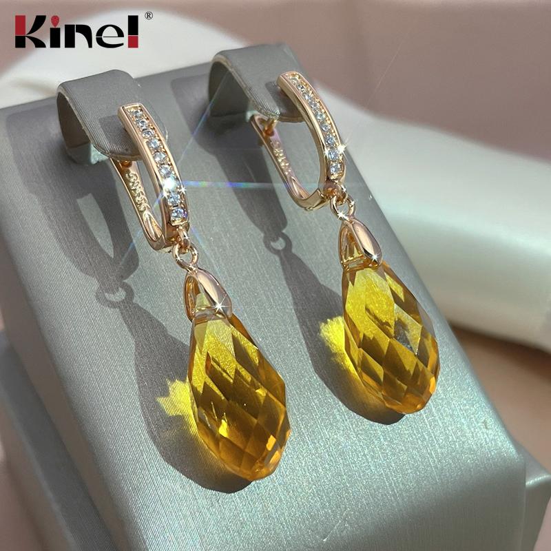 Женские серьги-капли Kinel с желтым блестящим цирконом розового золота